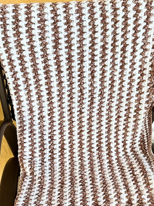 Baby Velvet Crochet Blanket 7 Brown and cream velvet baby blanket on a chair