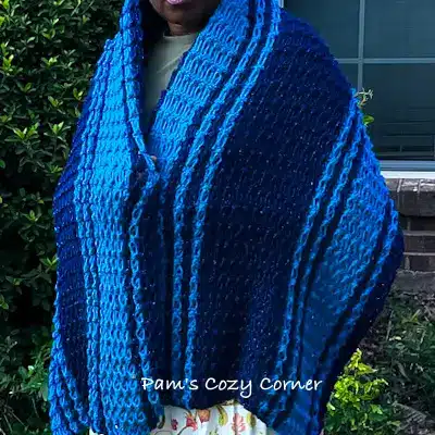 A woman wearing a striped two colored scarf