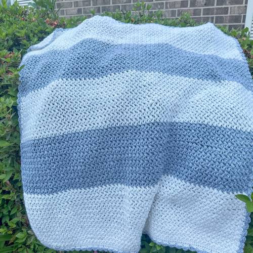 Bean stitch crochet baby blanket pattern in two colors using soft DK yarn