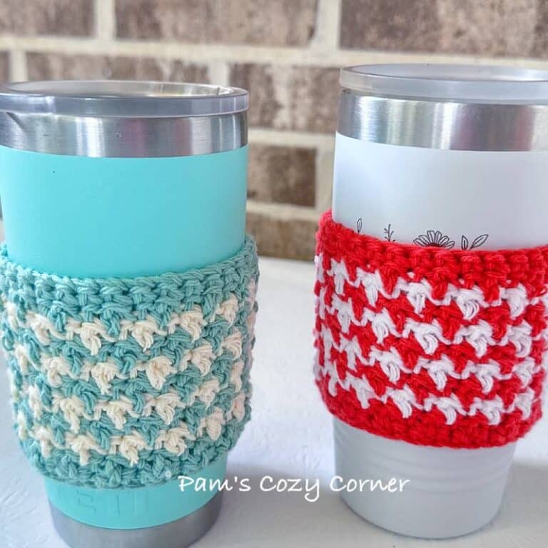 Textured crochet cup cozy made with Lily Sugar'n Cream 100% cotton yarn in two colors, wrapped around a reusable coffee cup.