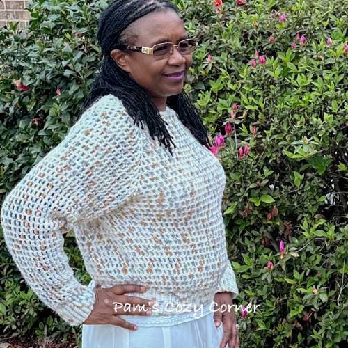 Easy Crochet Lace Sweater Pattern - Freesia 5 Handmade crochet lace sweater with a delicate mesh stitch design, created with a top-down crochet pattern.